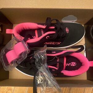 Black and pink Heelys youth size 2 USA